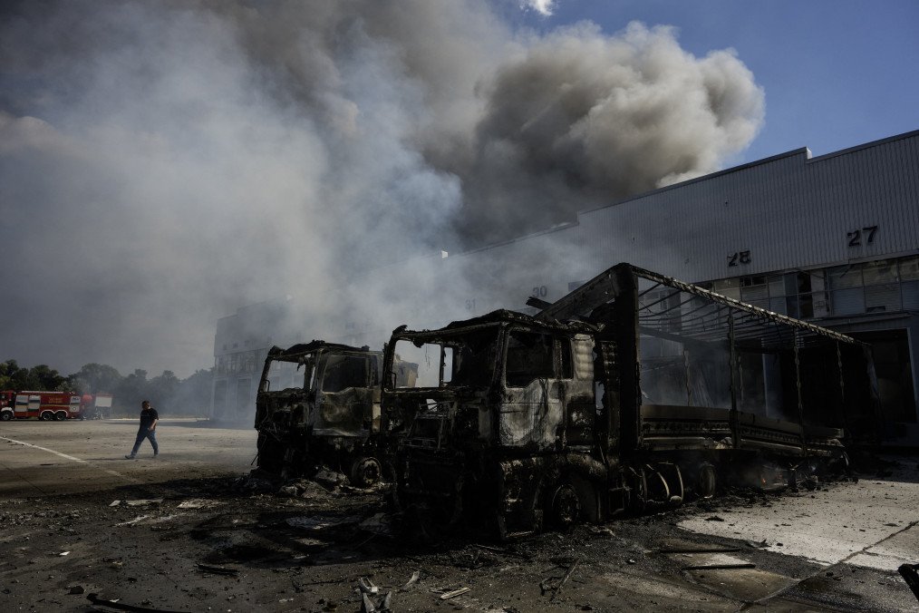 A man walks past burned-out trucks near a warehouse damaged in a Russian air attack on Kyiv on September 2, 2026. Illustrative photo. (Source: Getty Images)