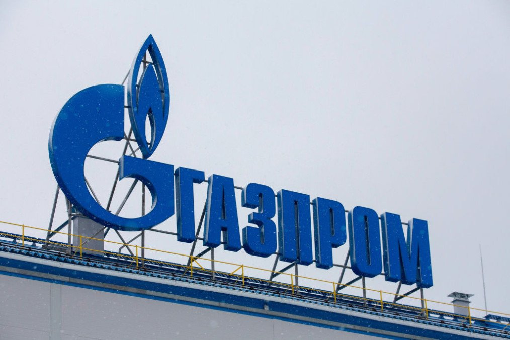 A Gazprom logo above the Gazprom PJSC Slavyanskaya compressor station, the starting point of the Nord Stream 2 gas pipeline, in Ust-Luga, Russia. (Source: Getty Images)