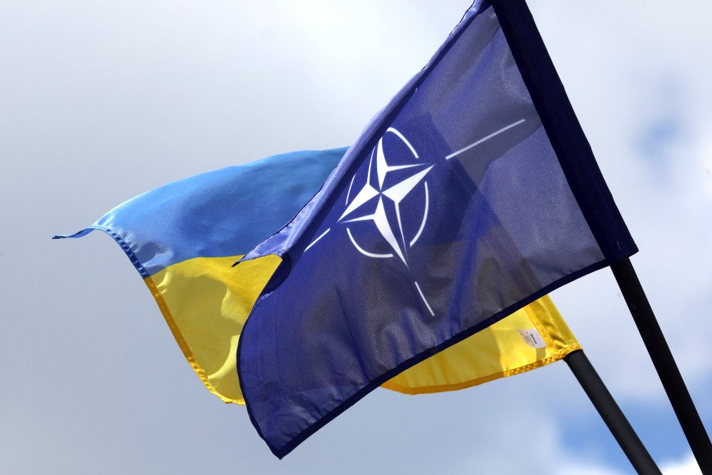NATO and Ukraine Launch New Phase of UNITE Brave NATO Innovation Program The NATO and Ukrainian flag are pictured in Vilnius, Lithuania on July 9. (Source: Getty Images)