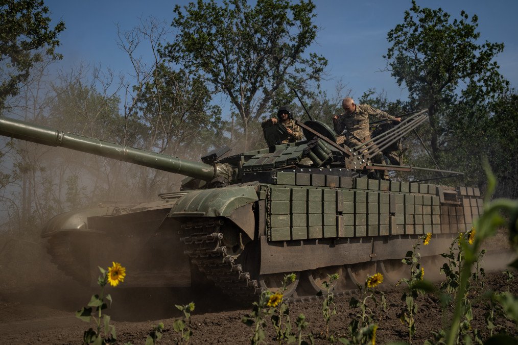 Ukrainian soldiers ride their tank in the Kherson region, Ukraine, on August 8, 2025. (Source: Getty Images)