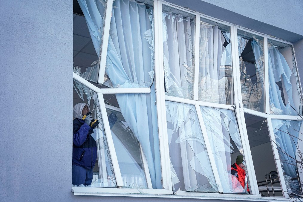 Workers dismantle windows of a school cafeteria, broken following a Russian drone strike on a nearby residential building on February 3, 2026, in Kyiv, Ukraine. (Source: Getty Images) Workers dismantle windows of a school cafeteria, broken following a Russian drone strike on a nearby residential building on February 3, 2026, in Kyiv, Ukraine. (Source: Getty Images)