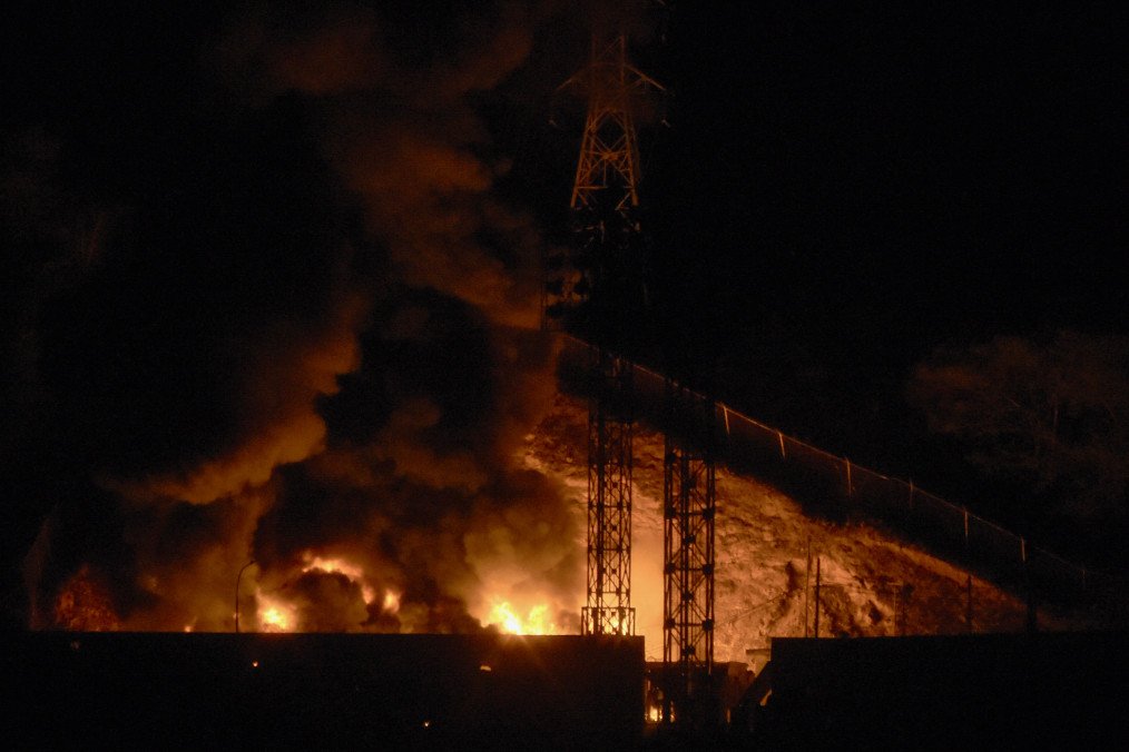 Fire burns at Fuerte Tiuna, Venezuela’s largest military complex, following a series of explosions in Caracas on January 3, 2026, amid reports of aircraft activity over the city. (Source: Getty Images)