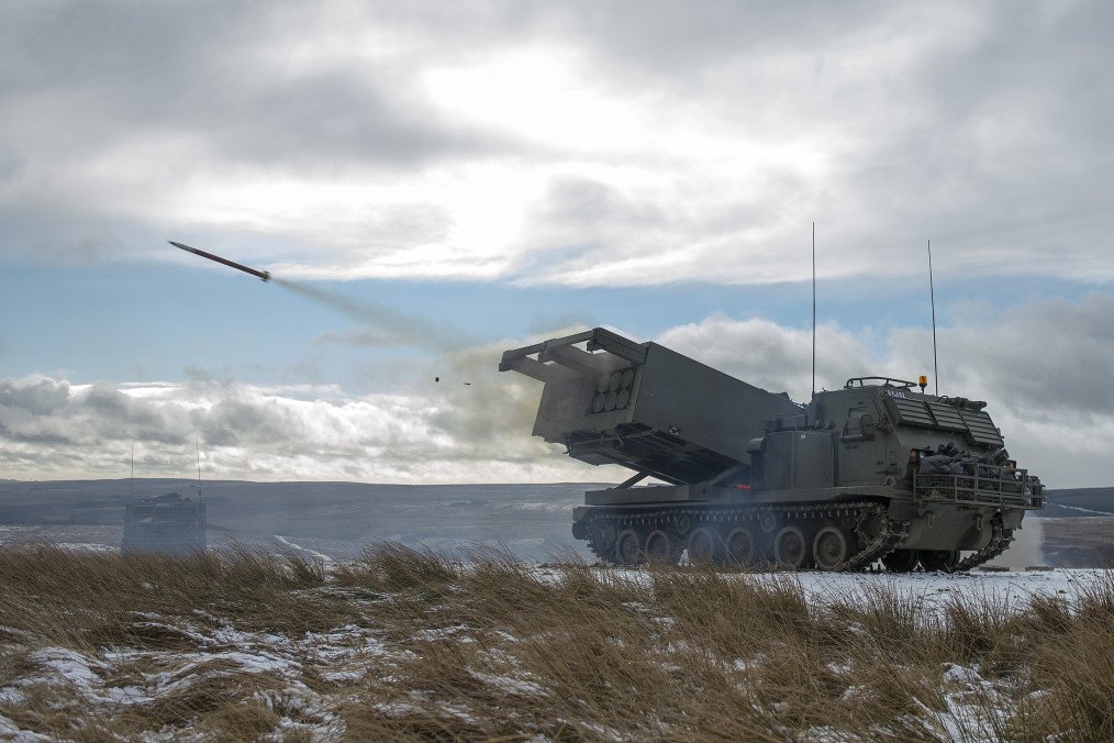 Illustrative image. M270 MLRS during live-fire training in the UK, 2015. (Source: Wikimedia)