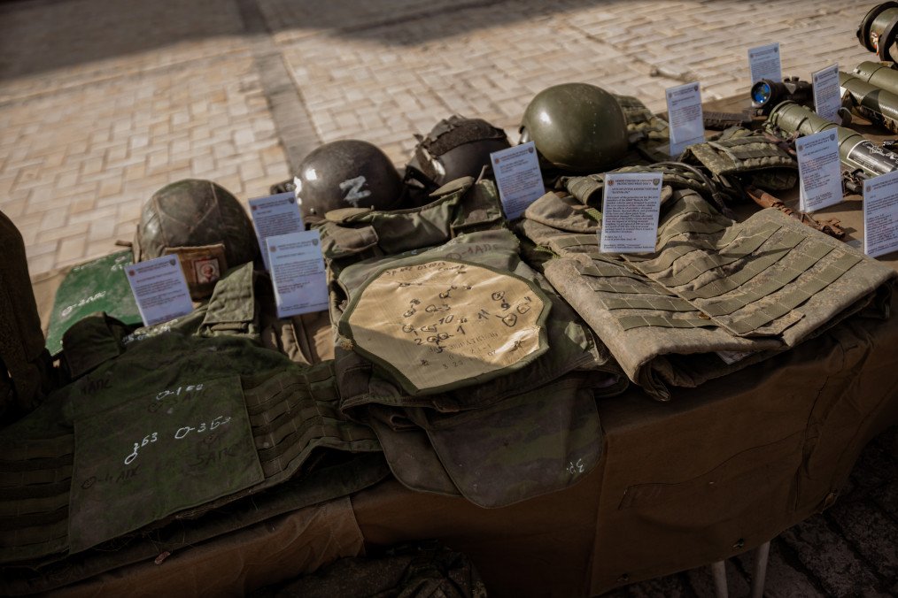 Russian military helmets and bulletproof vests are displayed during an open-air exhibition of destroyed Russian military equipment and tactical gear on June 15, 2023, in Kyiv, Ukraine. (Source: Getty Images)