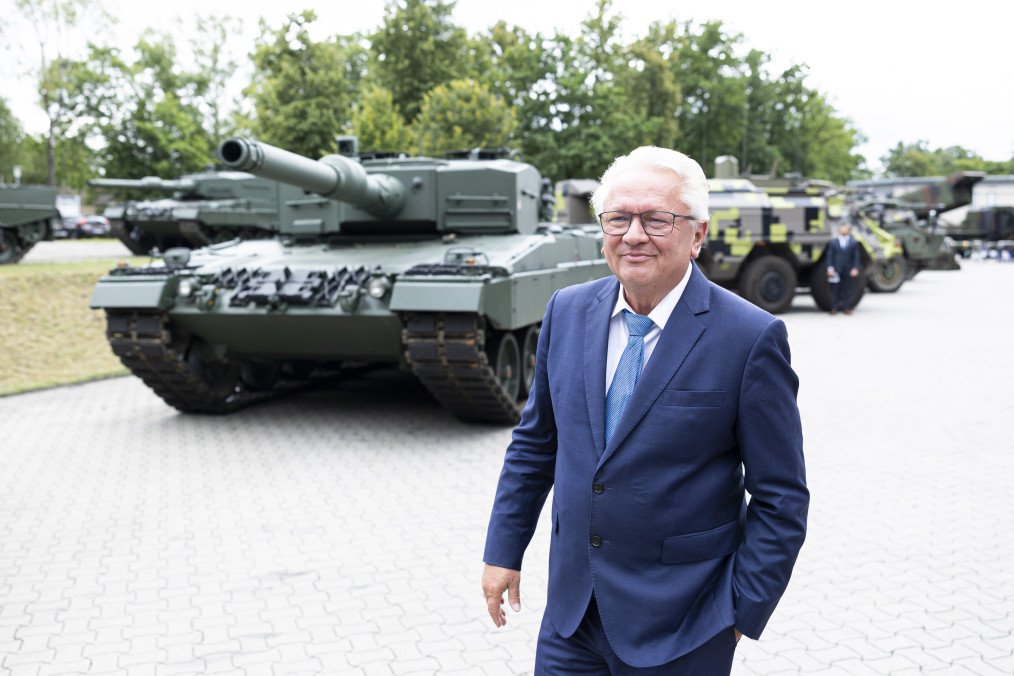 Armin Papperger, CEO of Rheinmetall AG, stands in front of a Leopard 2 A4 main battle tank during a visit to the Rheinmetall plant in Unterlüß, Lower Saxony, July 24, 2025. (Source: Getty Images)