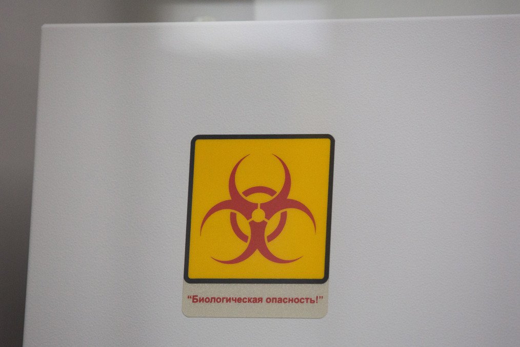 A biohazard sticker is displayed at the Invitro LLC laboratory in Moscow, Russia, on Wednesday, April 15, 2020. Illustrative image. (Source: Getty Images)