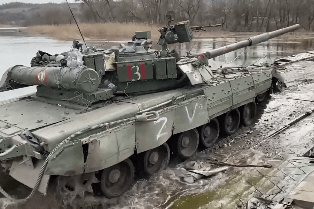 Russian tank crossing a river somewhere in Ukraine, 2022. Russian tank crossing a river somewhere in Ukraine, 2022.
