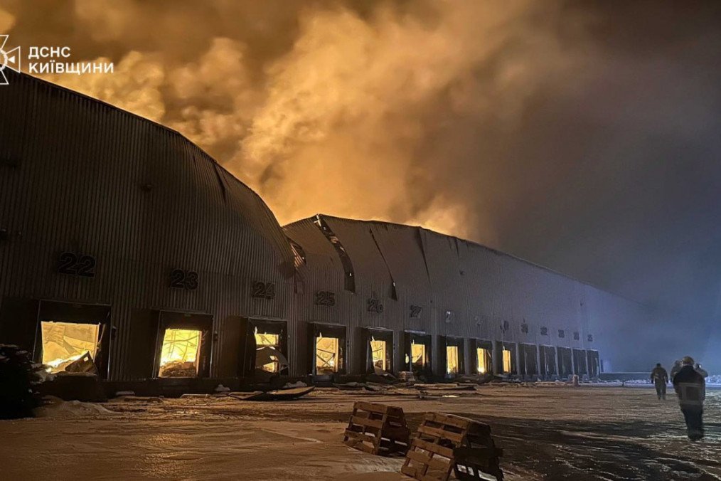 A large warehouse complex burns following a reported Russian drone strike during the overnight attack on Ukraine’s energy and logistics infrastructure. (Photo: DSNS Kyiv Region)