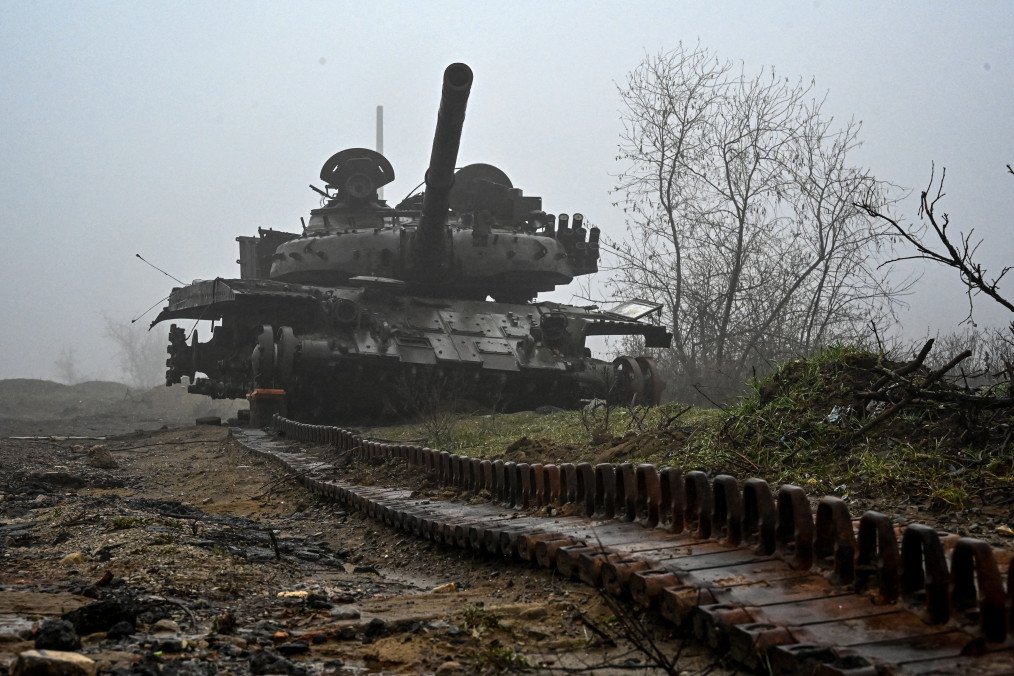 A destroyed Russian tank on the outskirts of the village of Kamyanka near Izyum, Kharkiv region, on December 13, 2022. (Source: Getty Images)