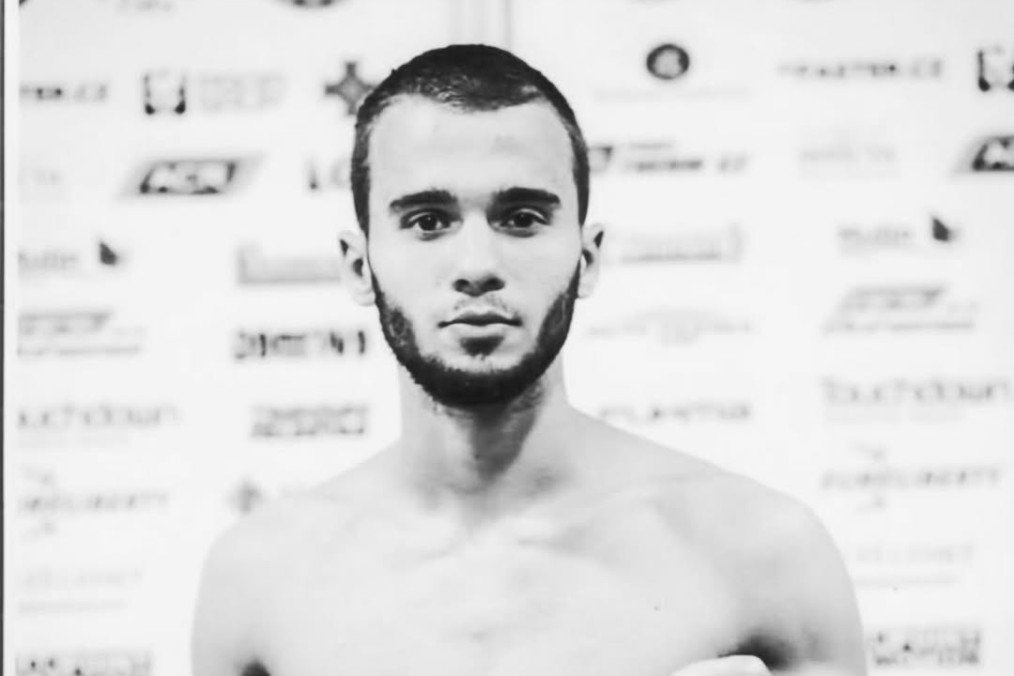 A black-and-white photo of Ukrainian athlete and coach Dmytro Rusetzkyi. (Source: Olha Pavlenko/Instagram)