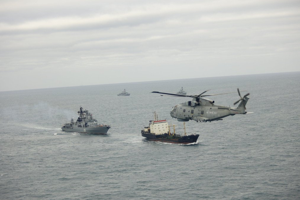 UK Wildcat helicopter from 815 Naval Air Squadron with other UK warships shadows Russian Udaloy-class destroyer Severomorsk nd its accompanying oiler, April 9, 2026. (Source: Royal Navy)