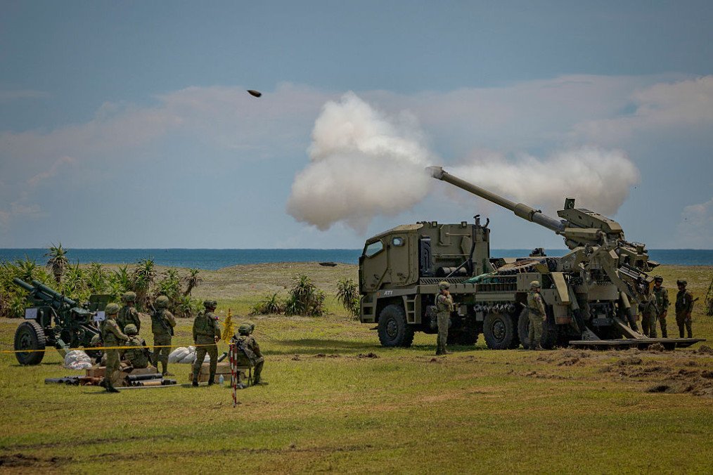 Philippine troops fire an ATMOS 155mm howitzer during a counter landing live fire exercise at a beach as part of US-Philippines joint military exercises on May 03, 2025 in Aparri, Cagayan province, Philippines. (Source: Getty Images)
