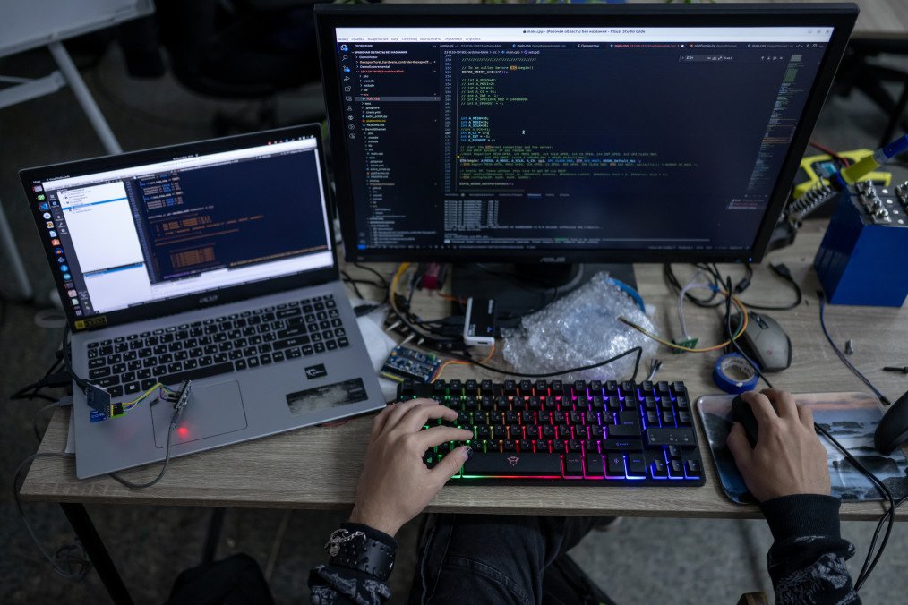The employees of Ukrainian company DevDroid adjust the operation of the remote-controlled turret “THP” at the company’s office in the Lviv region of Ukraine, on November 30, 2023. (Source: Getty Images)