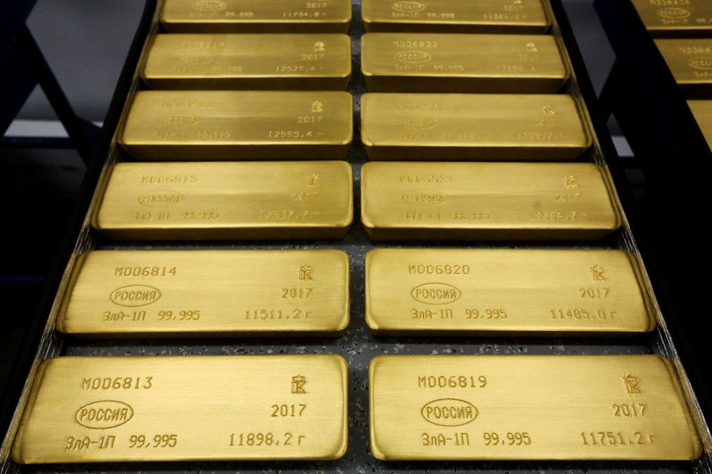 Gold bars with engraved marks to identify the purity content, the year of manufacture and the country of origin engraved, sit on a trolley ahead of distribution in Krasnoyarsk, Russia. (Source: Getty Images)