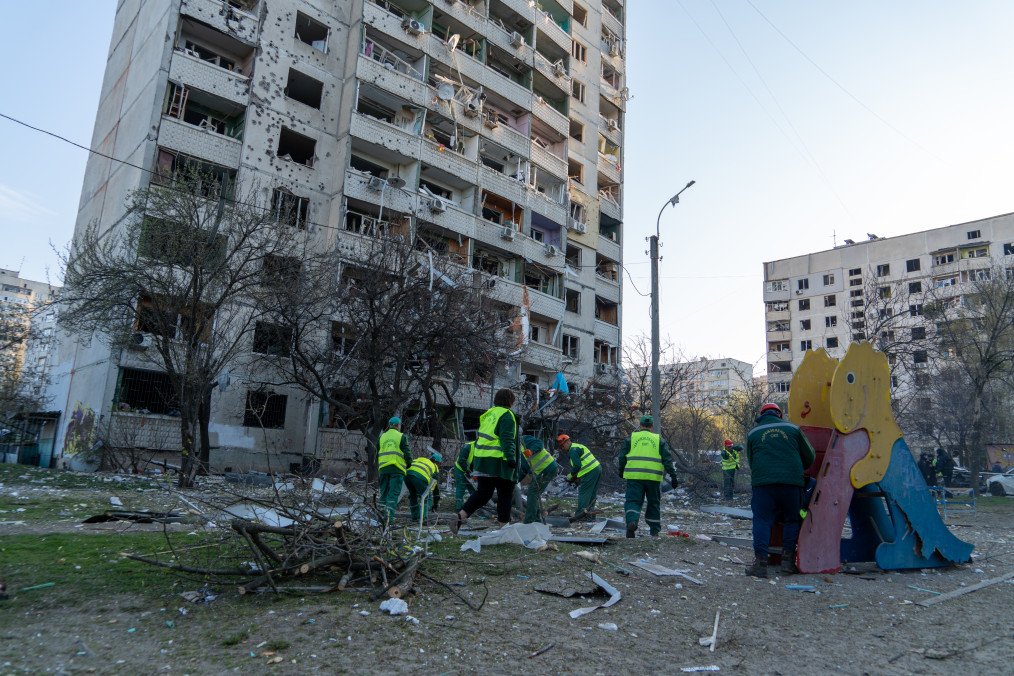 Poland and Iceland Tip the Balance as Russia Special Tribunal Clears Key Threshold Utility workers clean up rubble and debris on the playground near damaged residential building after Russian missile attack on April 18, 2025 in Kharkiv, Ukraine. (Source: Getty Images)