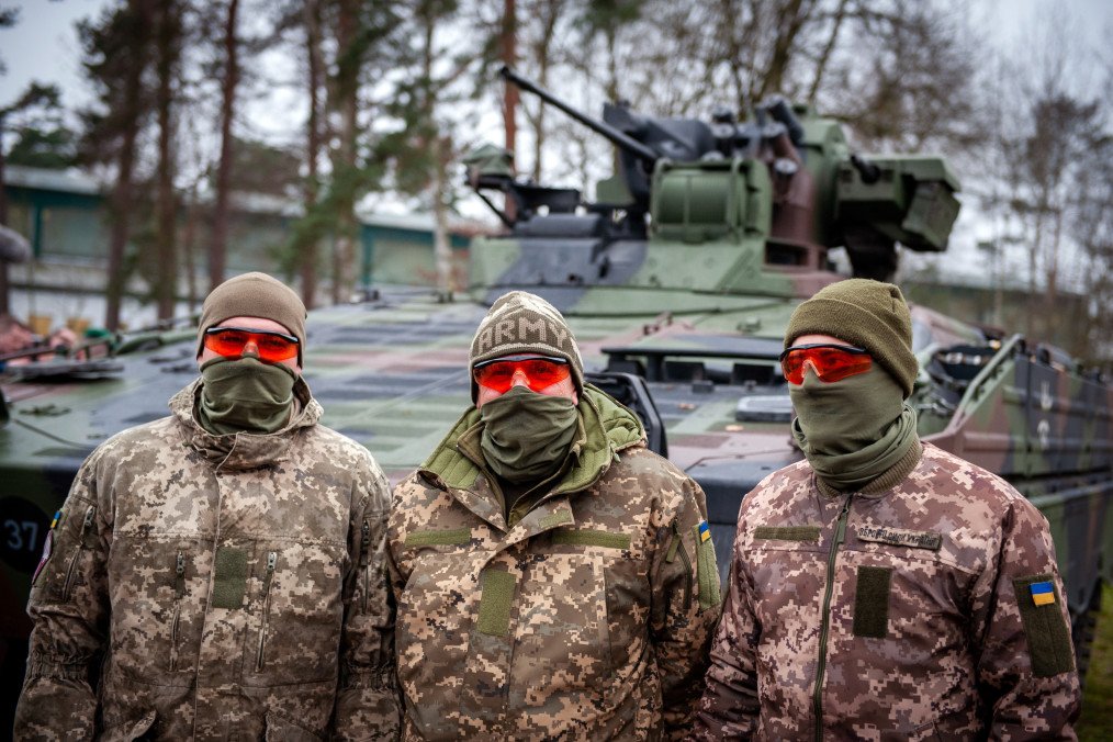 Ukrainian military personnel stand in front of a Marder Infantry Fighting Vehicle at the Panzertruppenschule on February 20, 2023, in Munster, Lower Saxony, Germany. Ukrainian military personnel stand in front of a Marder Infantry Fighting Vehicle at the Panzertruppenschule on February 20, 2023, in Munster, Lower Saxony, Germany.