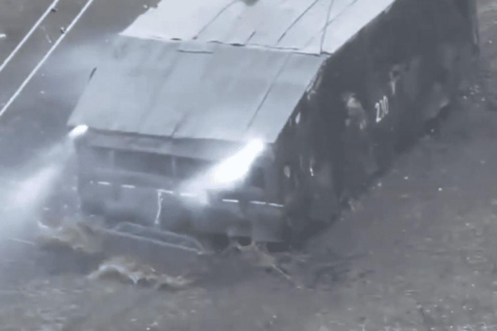 Ukrainian Sniper Takes Out Russian APC Driver From Over a Mile Away With .50 Cal Round, Video Ukrainian Sniper Takes Out Russian APC Driver From Over a Mile Away With .50 Cal Round, Video