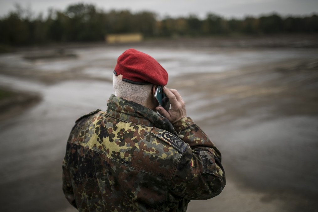 A soldier is talking on a mobile phone. (Source: Getty Images)
