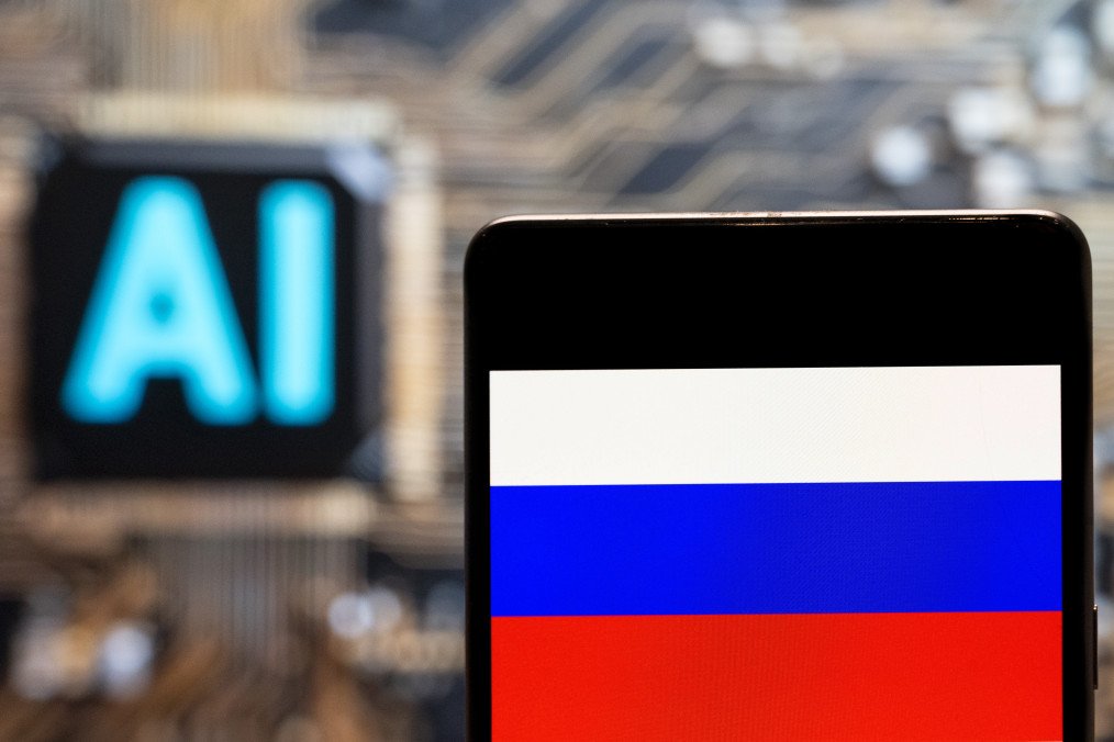 The Russian Federation flag seen displayed on a smartphone with an Artificial intelligence. (Source: Getty Images)