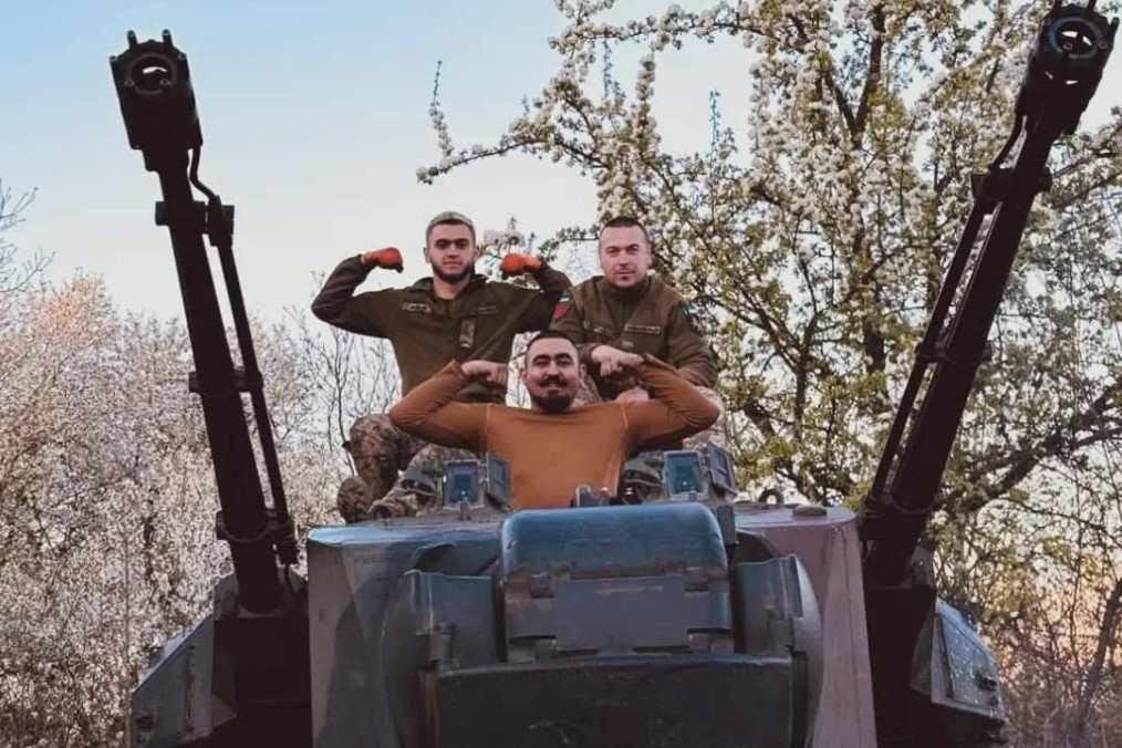 Junior Sergeant Mykola with his crew on a Gepard (Cheetah) air defense system.
