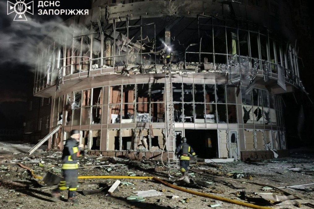 Emergency crews extinguish a blaze at a shopping center damaged during a Russian drone attack on Zaporizhzhia. (Source: State Emergency Service of Ukraine)