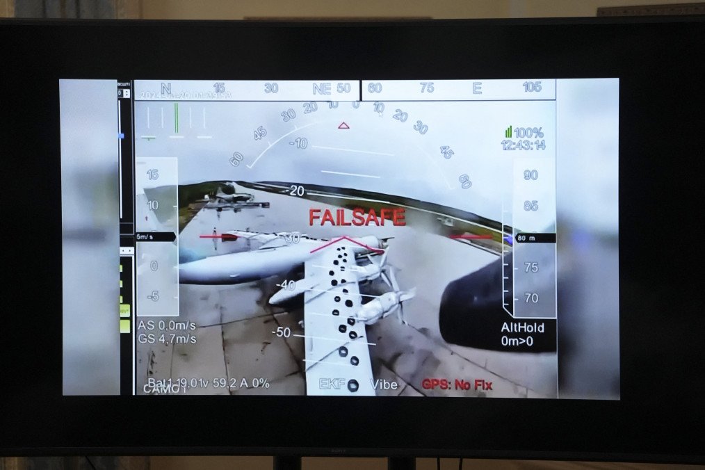A TV screen shows a clip from Ukraine’s Operation Spiderweb during a news conference at the Ukrainian Embassy in Washington, DC, on June 4, 2025.