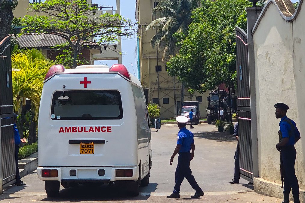An ambulance arrives at Sri Lanka’s southern naval headquarters in Galle on March 4, 2026, to transport Iranian sailors rescued after the Iranian frigate IRIS Dena sank off the island’s coast. (Source: Getty Images)
