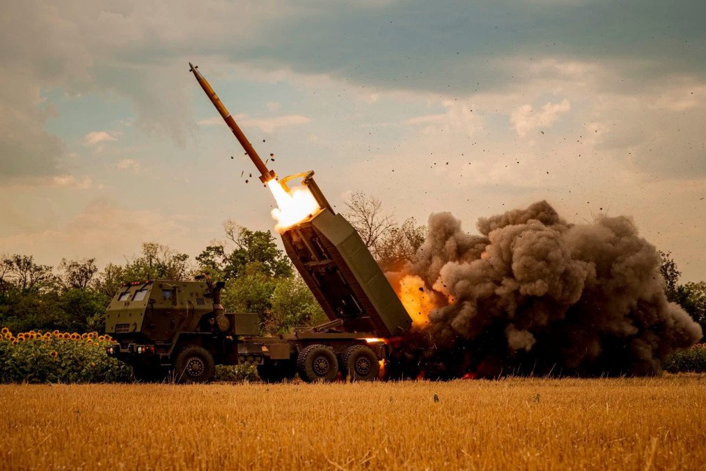 Ukrainian HIMARS missile launcher firing a missile. Ukrainian HIMARS missile launcher firing a missile.