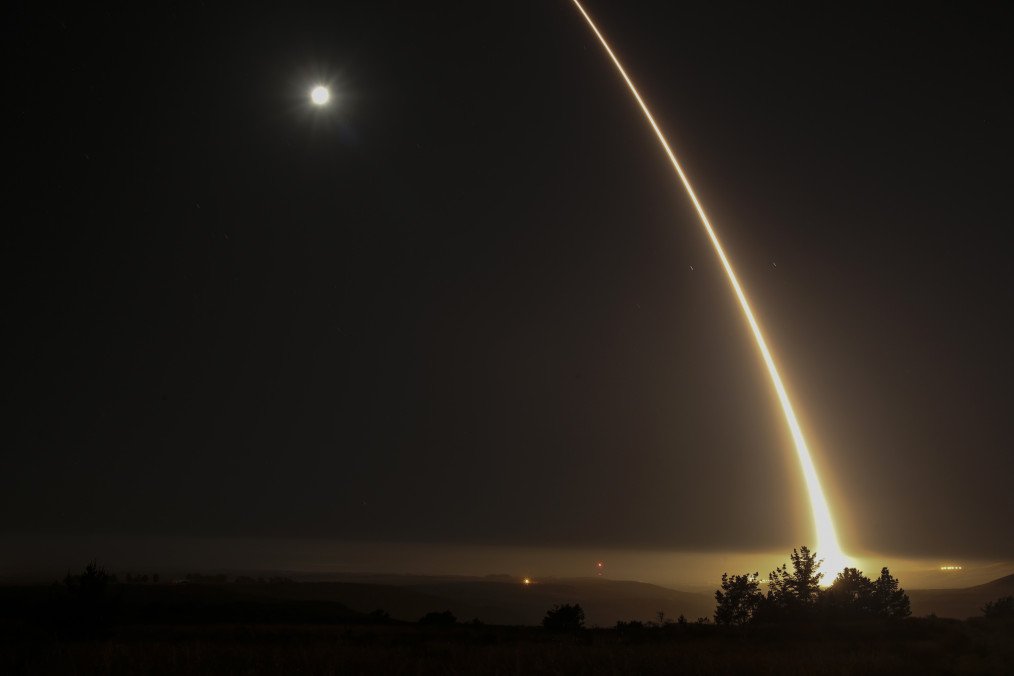 A streak of light trails off into the night sky. (Source: Getty Images)