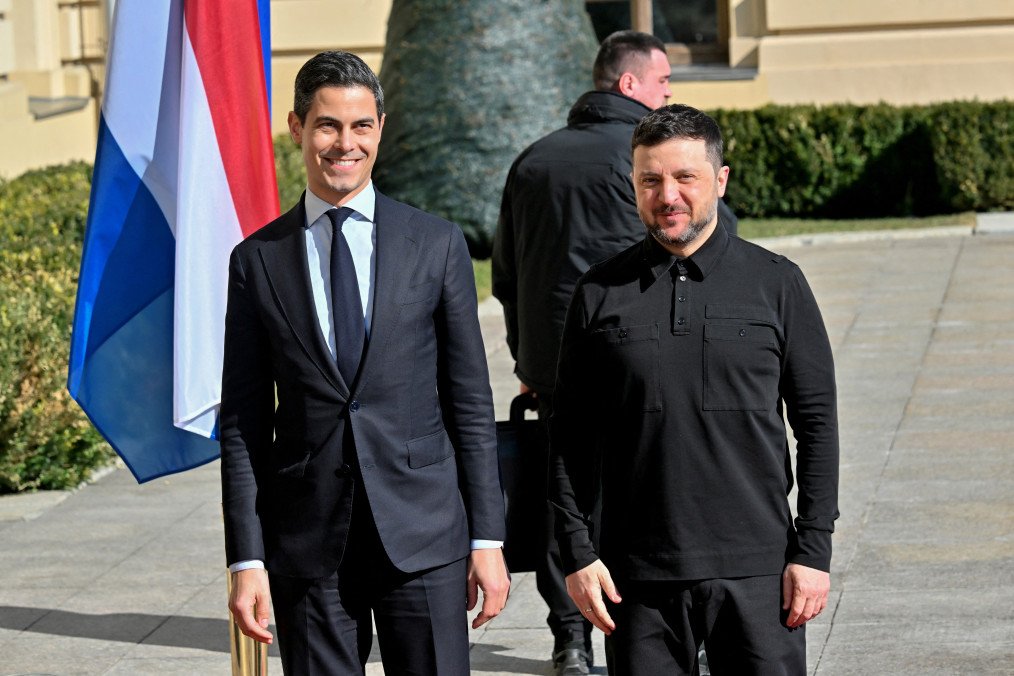 Ukraine's President Volodymyr Zelenskyy poses with The Netherlands' Prime Minister Rob Jetten upon his arrival and ahead of their meeting outside the Mariinskyi Palace in Kyiv on March 8, 2026. (Source: Getty Images)