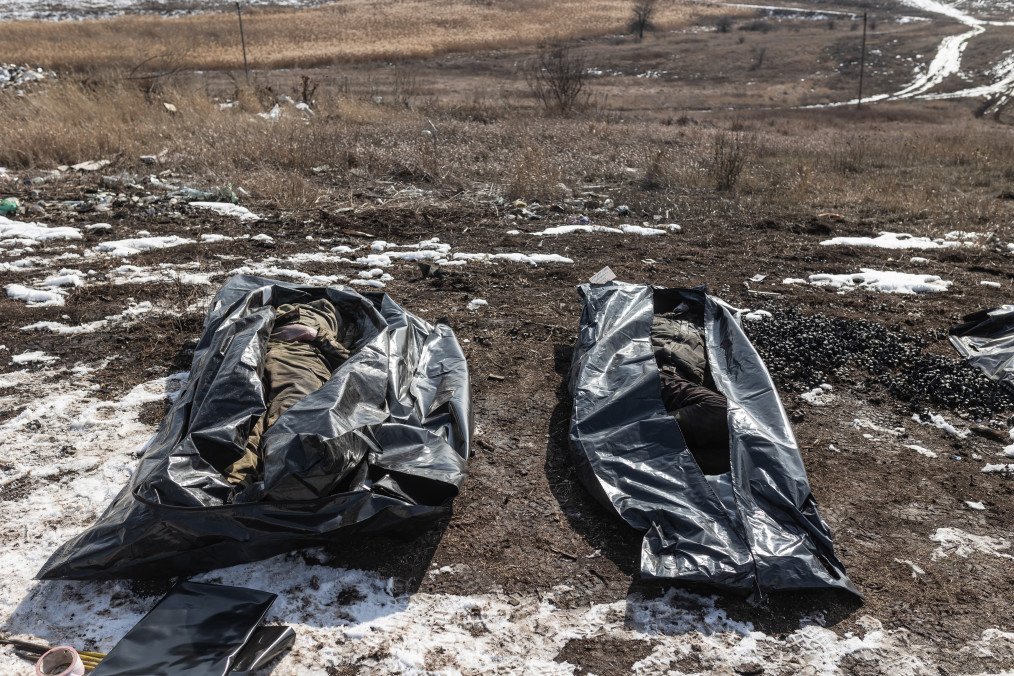 Volunteers from the Ukrainian organization Platsdarm recover and transport the bodies of deceased Russian soldiers from former combat positions in Donetsk region for identification and eventual repatriation to Russia, March 2, 2025. (Photo: Getty Images)