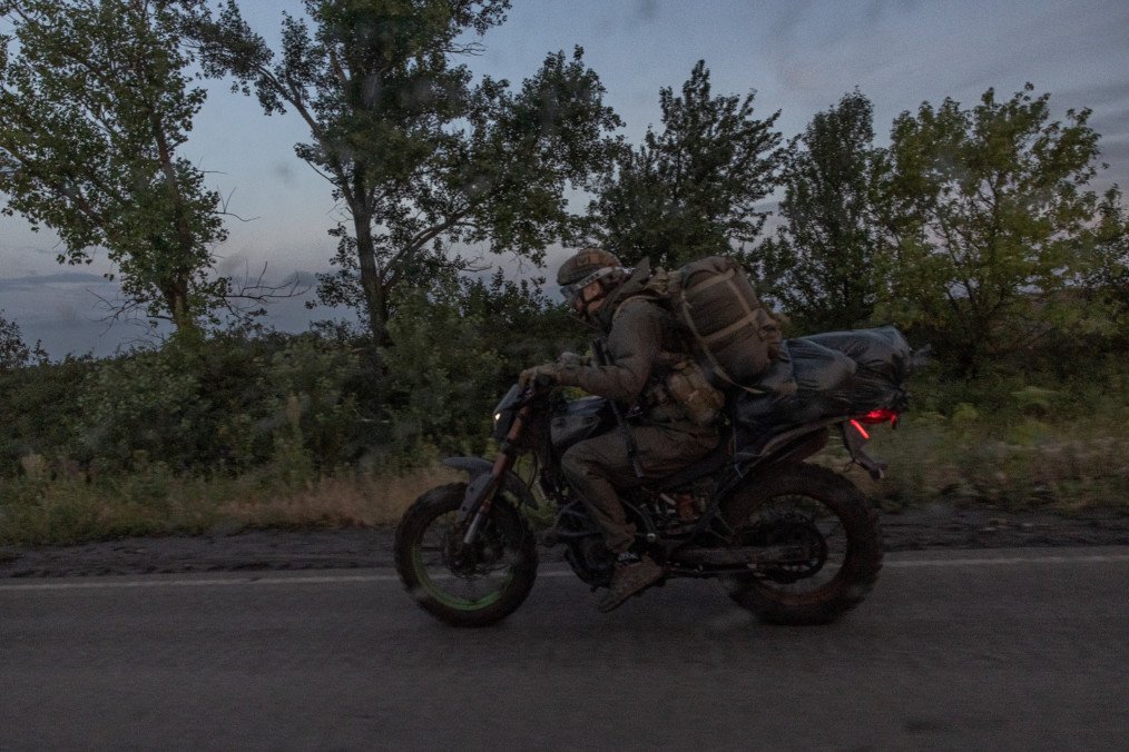A Ukrainian serviceman rides a motorcycle in the Donetsk region amid Russia’s full-scale invasion of Ukraine. (Source: Getty Images)