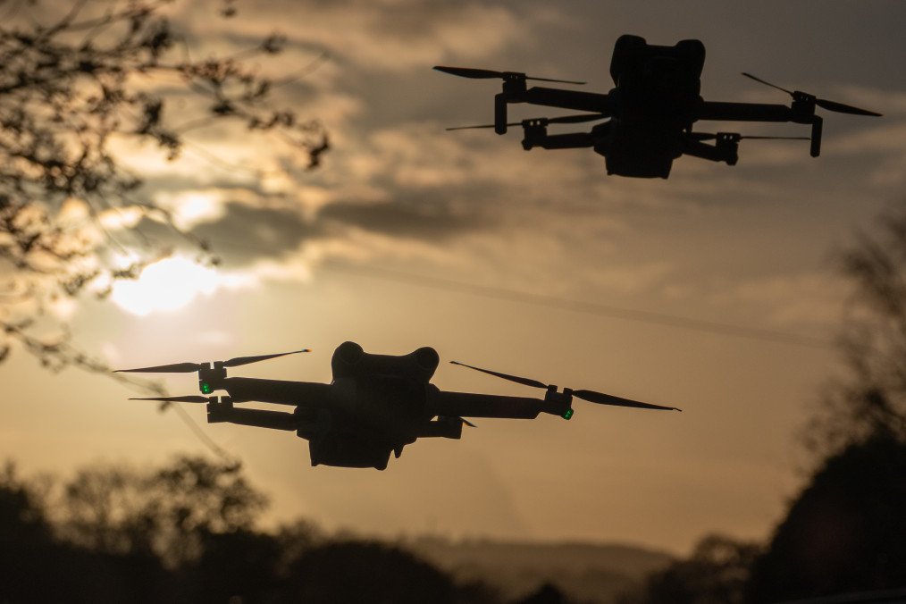 DJI drones fly on November 8, 2025, in Glastonbury, England. (Source: Getty Images)