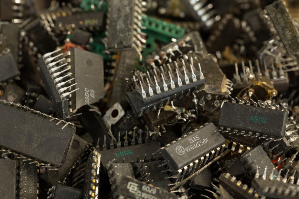 Recycled microchips and electrical components to be used for gold material salvage sit in a container at the JSC Krastsvetmet non-ferrous metals plant in Krasnoyarsk, Russia. (Source: Getty Images)
