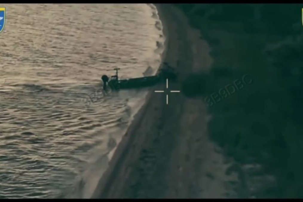 An unmanned surface vessel lands an armed ground robot on the occupied Kinburn Spit during a Ukrainian combat operation. (Source: 123rd Separate Territorial Defense Brigade)
