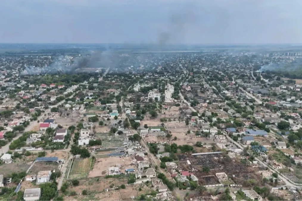 Aerial view of Oleshky, Kherson region, with smoke rising over parts of the city. Aerial view of Oleshky, Kherson region, with smoke rising over parts of the city.