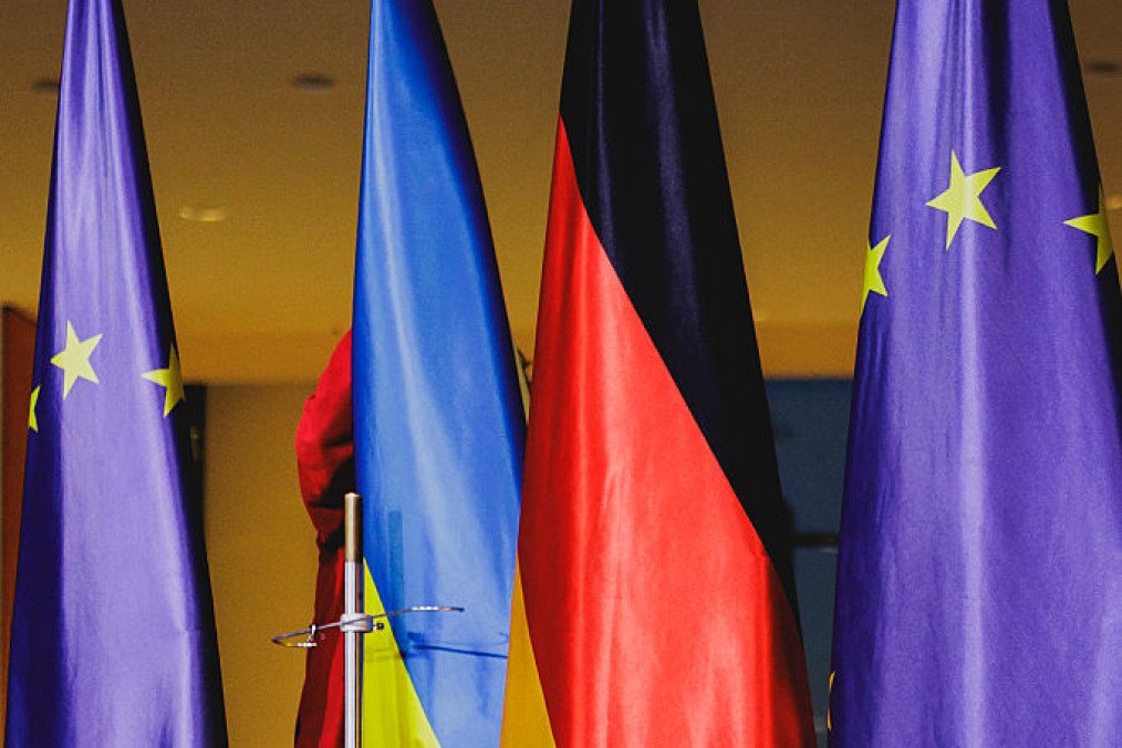 The Ukrainian flag is built up between the German flag and the flag of the European Union on December 15, 2025 in Berlin, Germany. (Source: Getty Images)