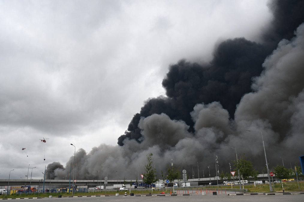Firefighting helicopters respond to a blaze at the Moscow Oil Refinery following a large-scale Ukrainian drone attack on June 18, 2026. (Source: Getty Images)
