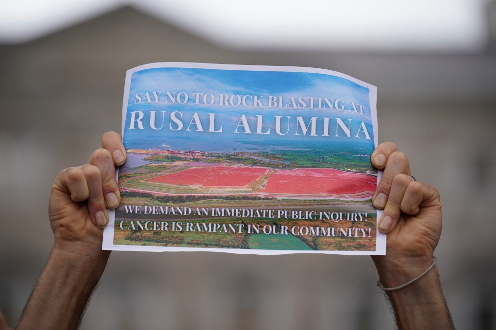 Activists from Future Proof Clare protest outside Leinster House in Dublin against the Aughinish Alumina plant owned by Rusal. (Source: Getty Images)
