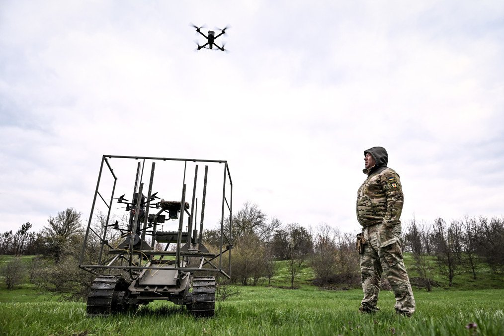 Ukraine’s Unmanned Systems Forces Hit 180,000 Targets in May, Neutralised More Russian Troops Than Recruited A soldier with the call sign ''Pavuk'' (''Spider'') watches a drone take off from a ground robotic complex during trials at a training ground on April 10, 2026. (Source: Getty Images)