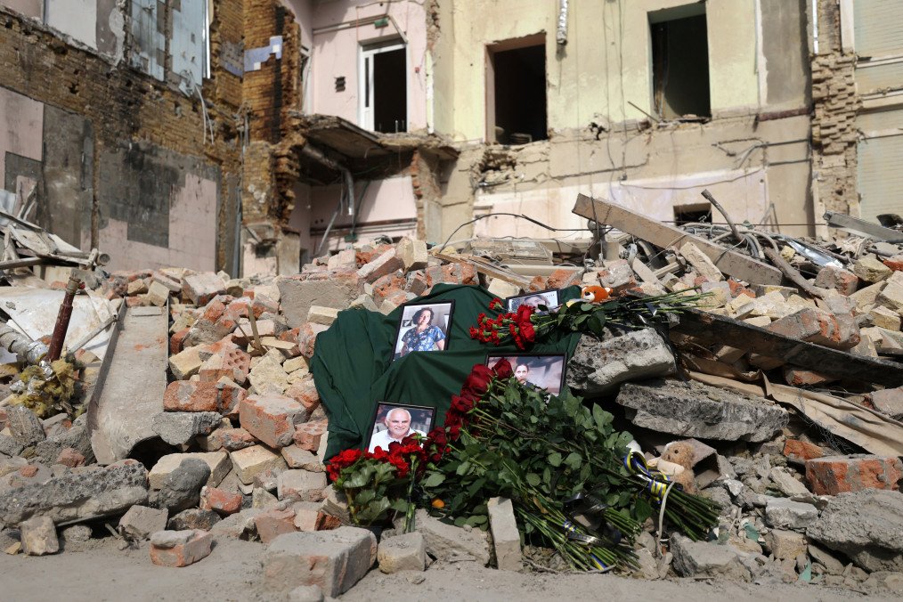 This photograph shows an improvised memorial with portraits of the victims displayed on the ruins of one of the medical buildings of the Okhmatdyt children's hospital in Kyiv, on July 12, 2024. (Source: Getty Images)