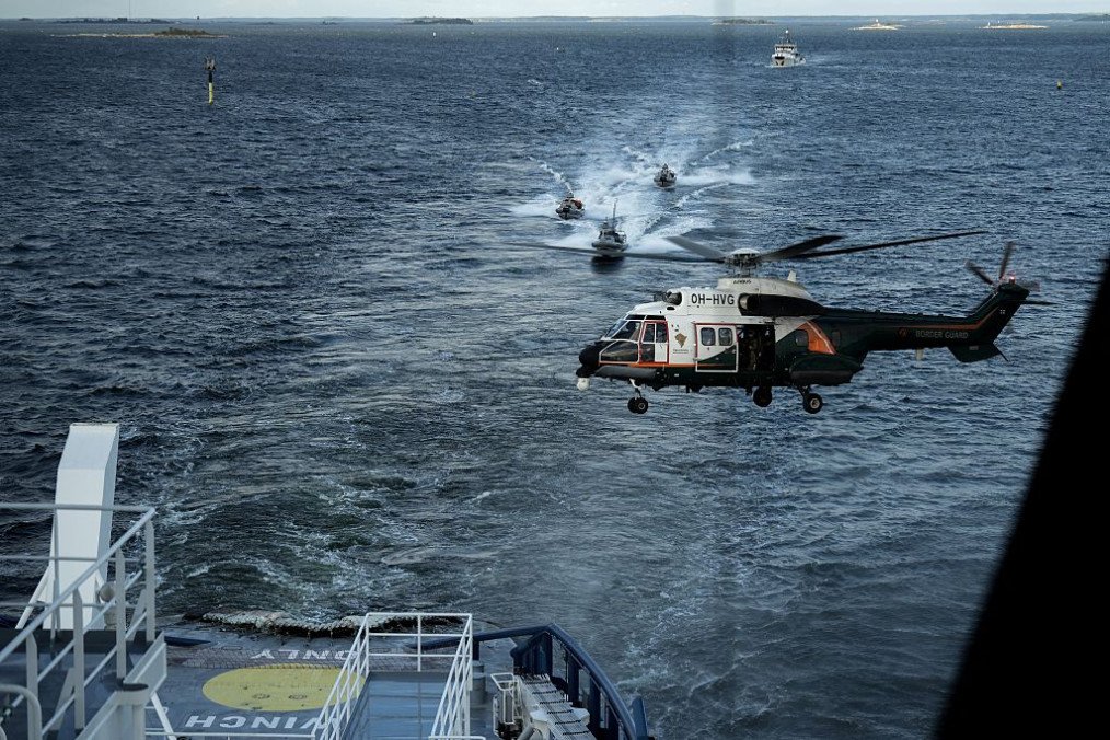 An Airbus Helicopter OH-HVG AS332L Super Puma of the Finnish Border Guard approaches the Finnish icebreaking vessel Polaris off Helsinki in the Gulf of Finland during MARSEC EU 26 joint exercise on September 17, 2026. (Source: Getty Images)