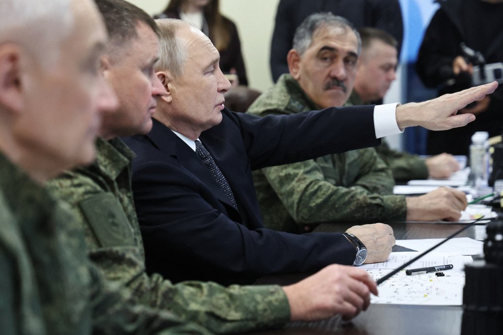 Russian leader Vladimir Putin gestures as he visits an observation post during the “Center-2026” strategic command-and-staff exercise at the Chebarkulsky training ground in Chelyabinsk Region on October 2, 2026. Russian leader Vladimir Putin gestures as he visits an observation post during the “Center-2026” strategic command-and-staff exercise at the Chebarkulsky training ground in Chelyabinsk Region on October 2, 2026.
