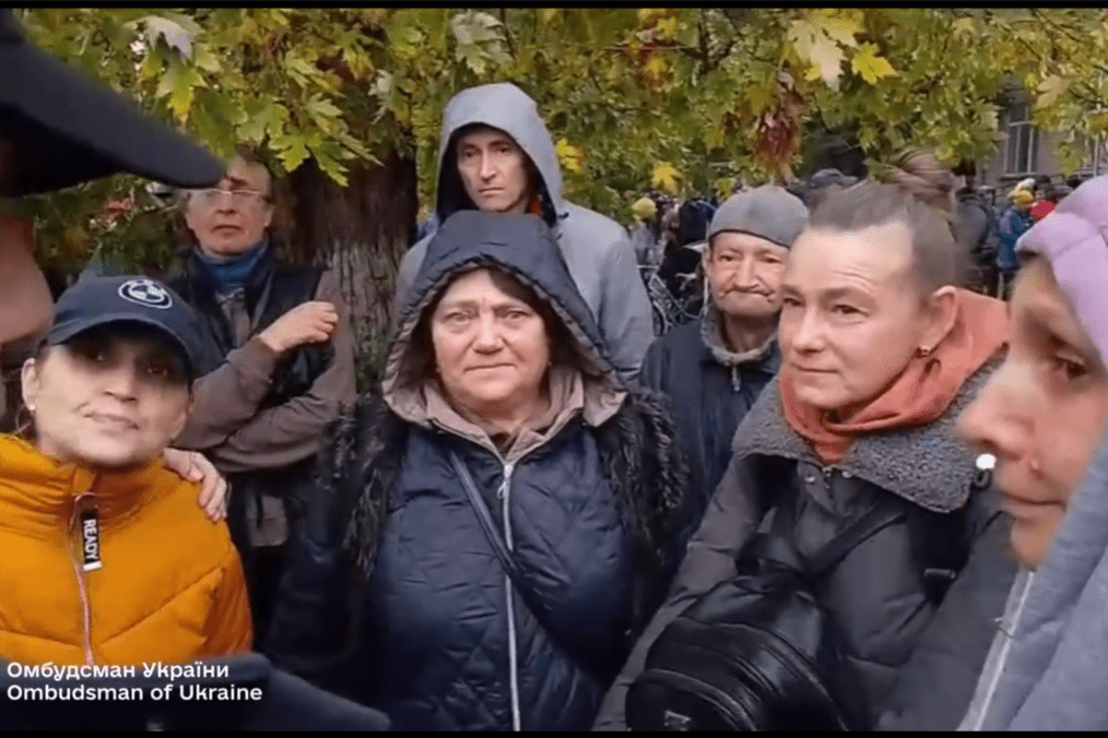 Residents of Oleshky greet Ukraine’s Human Rights Commissioner Dmytro Lubinets, Oleshky, Kherson region, Ukraine, October 30, 2026.