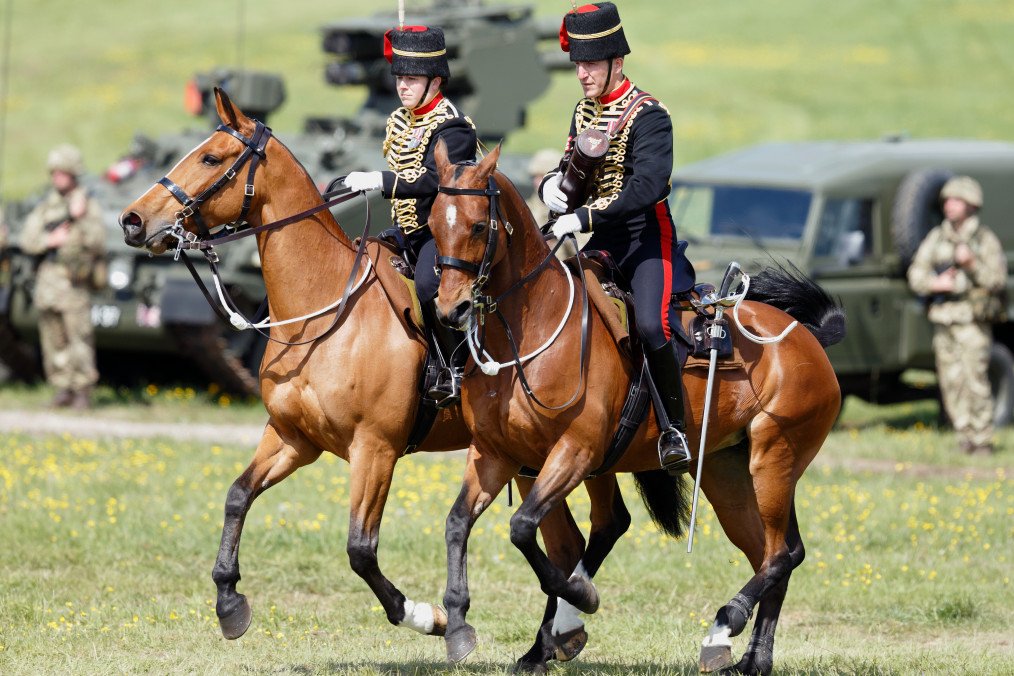 Mounted soldiers of The King’s Troop Royal Horse Artillery take part in a Royal Review on the occasion of their Tercentenary on May 26, 2016, in Lark Hill, England. (Source: Getty Images)