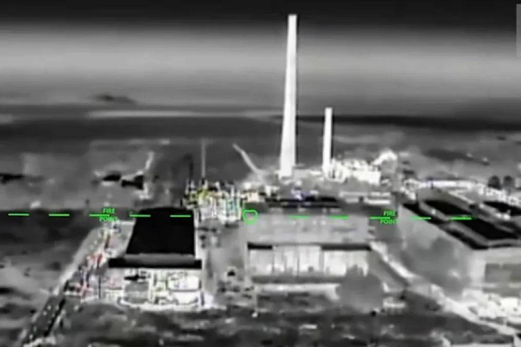 A screenshot from video released by Ukraine’s Unmanned Systems Forces showing the Crimea Titan chemical plant in occupied Armyansk, Crimea, during a drone strike on June 13, 2026. (Source: SBS)