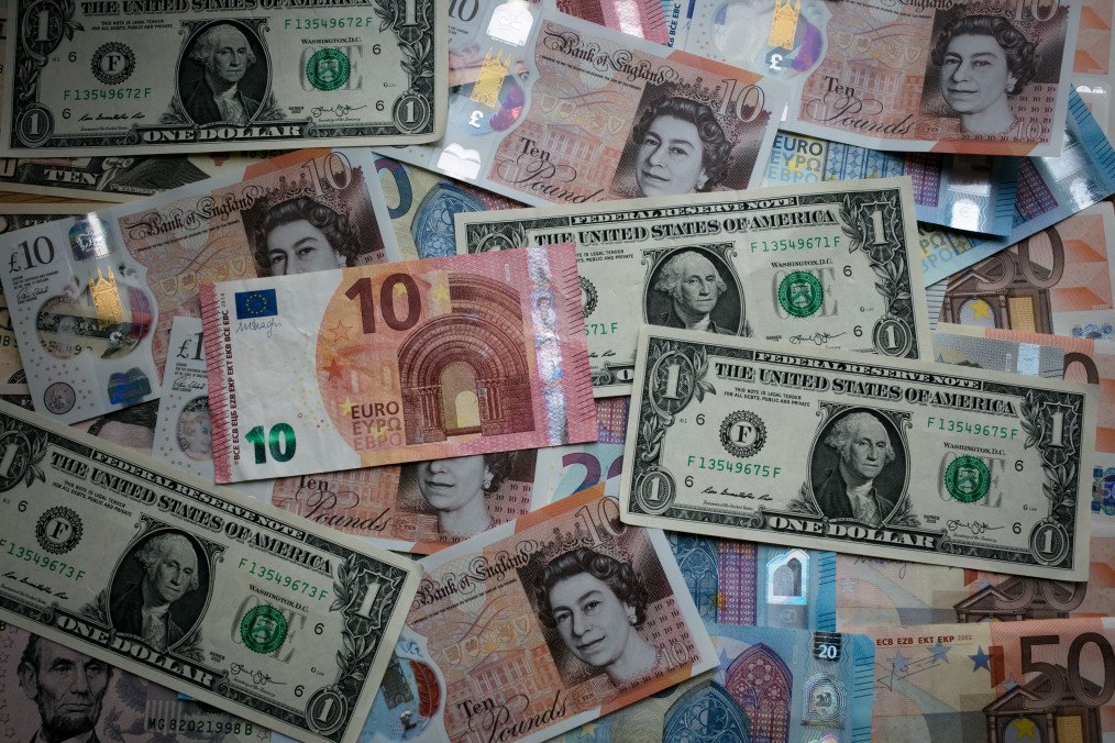 Photo illustration of the new £10 note is seen alongside euro notes and US dollar bills on October 13, 2017, in Bath, England. Photo illustration of the new £10 note is seen alongside euro notes and US dollar bills on October 13, 2017, in Bath, England.