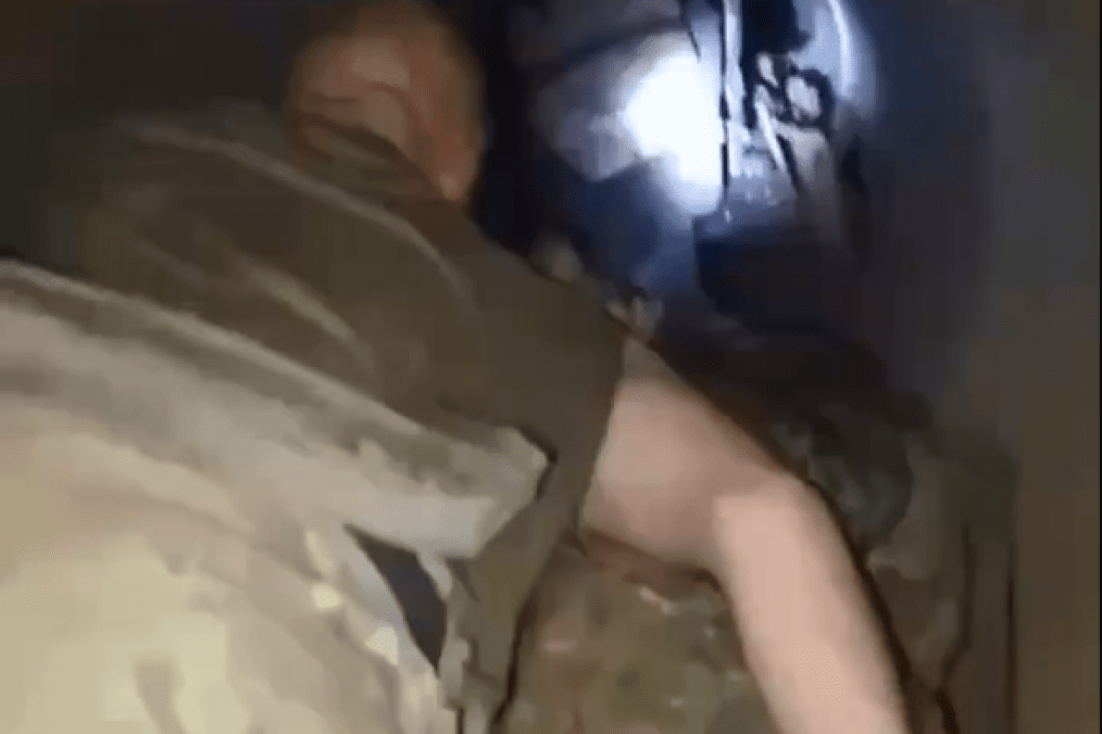 Russian soldiers reportedly moving inside a non-operational pipeline towards Kupiansk, Autumn 2025. (Photo: open source)