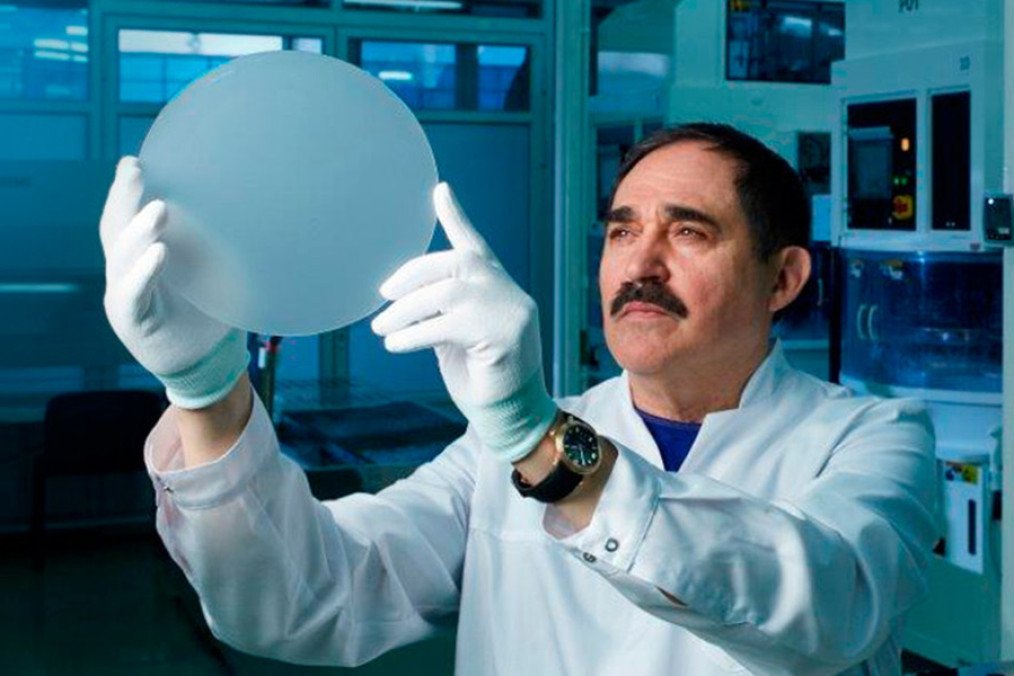 Vladimir Polyakov, founder and owner of the Energomera Group, which includes Monocrystal, holding a factory product.