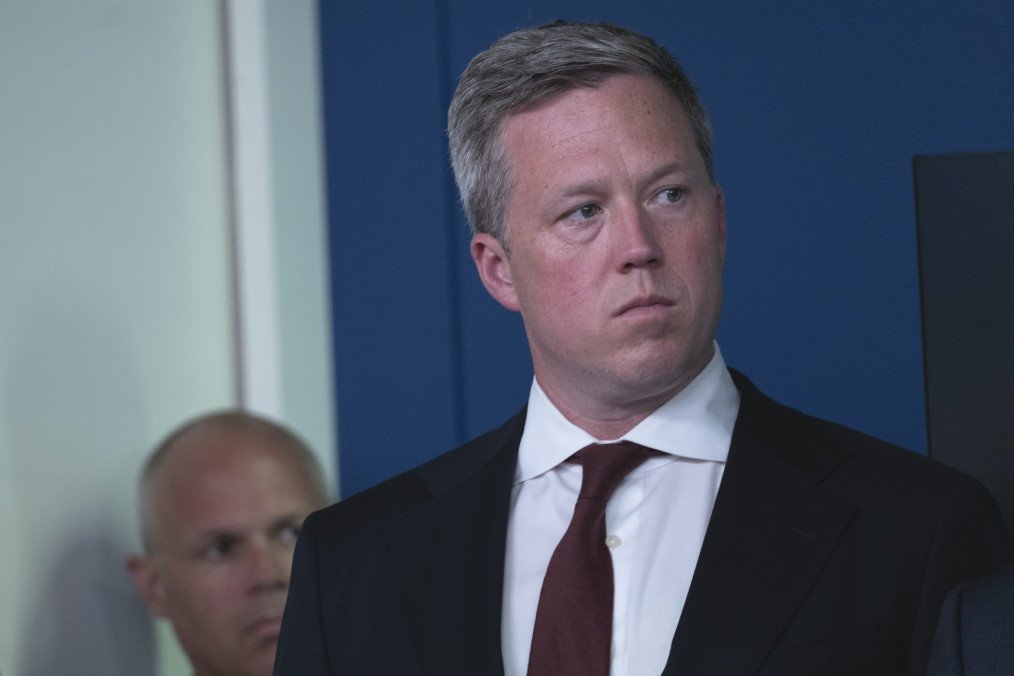 Army Secretary Dan Driscoll, listens to President Donald Trump speak to reporters, in the James Brady Press Briefing Room at the White House on August 11, 2025, in Washington, D.C. (Source: Getty Images)